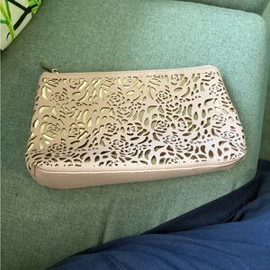 Elegant Beige Clutch with Floral Cutouts